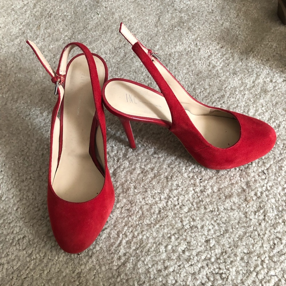 Red fabric platform heels with strap.